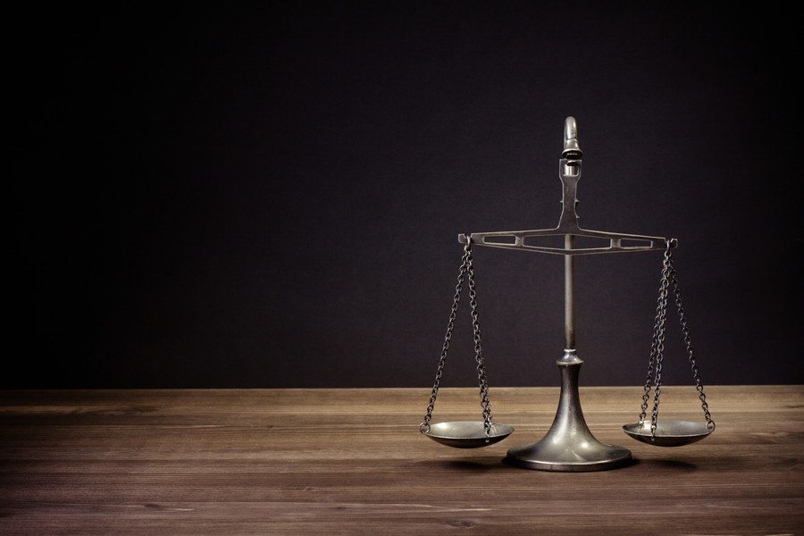 上海刑事律師解讀:冒充國(guó)家機(jī)關(guān)工作人員進(jìn)行詐騙的罪行認(rèn)定